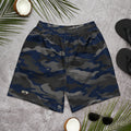 Front view of navy, charcoal and black camouflage athletic shorts with a small ATB logo, laid flat on a gray surface.